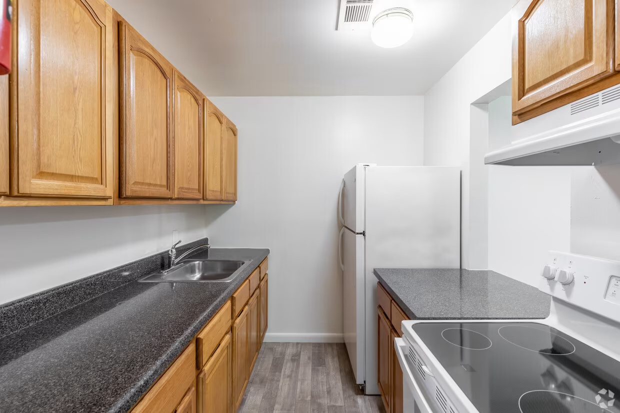 Bright galley kitchen in an Emerald Pond Estates one-bedroom apartment